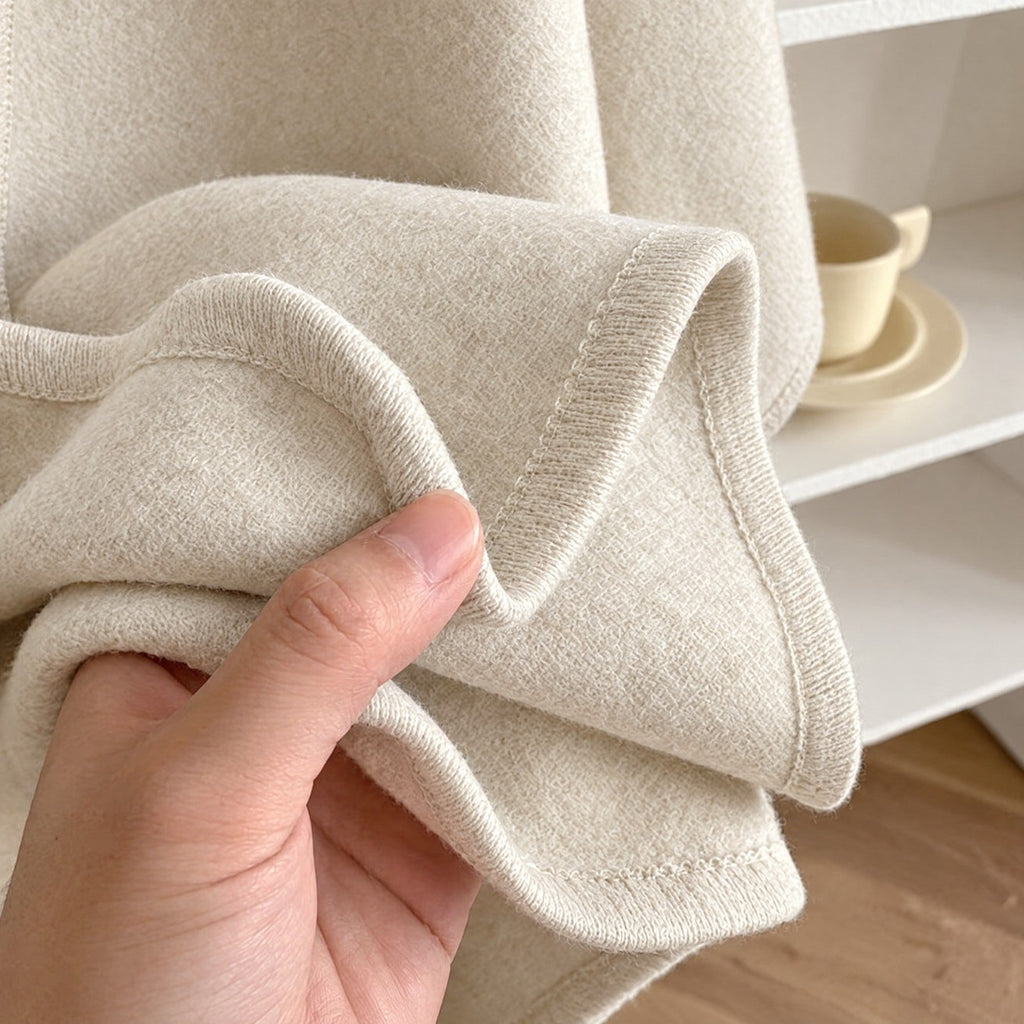 Stugans Poncho i Sand